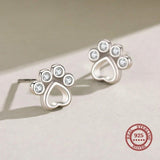 Boucles d'oreilles en argent en forme de patte avec zircone