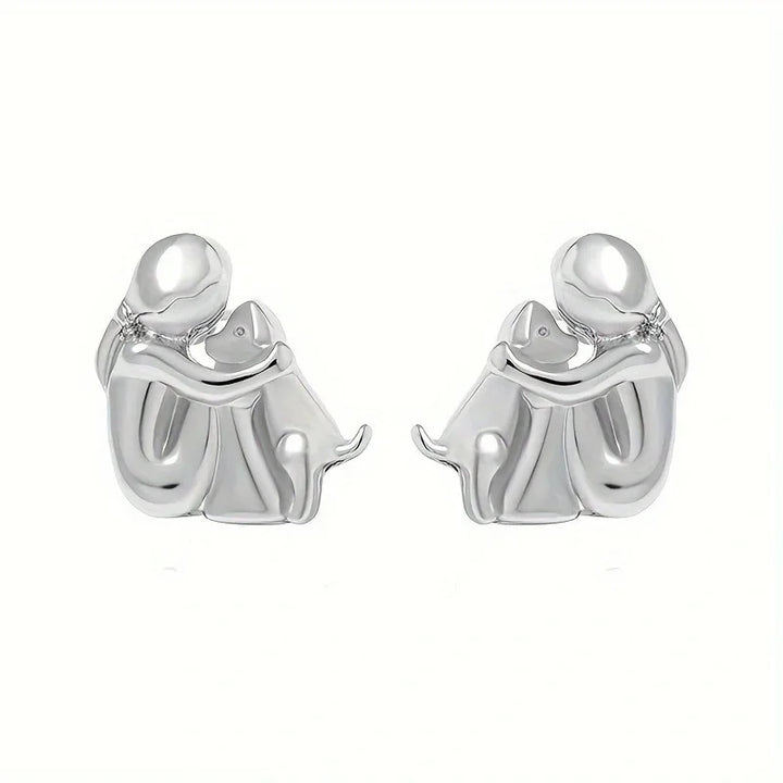 Boucles d'oreilles étreinte de chien