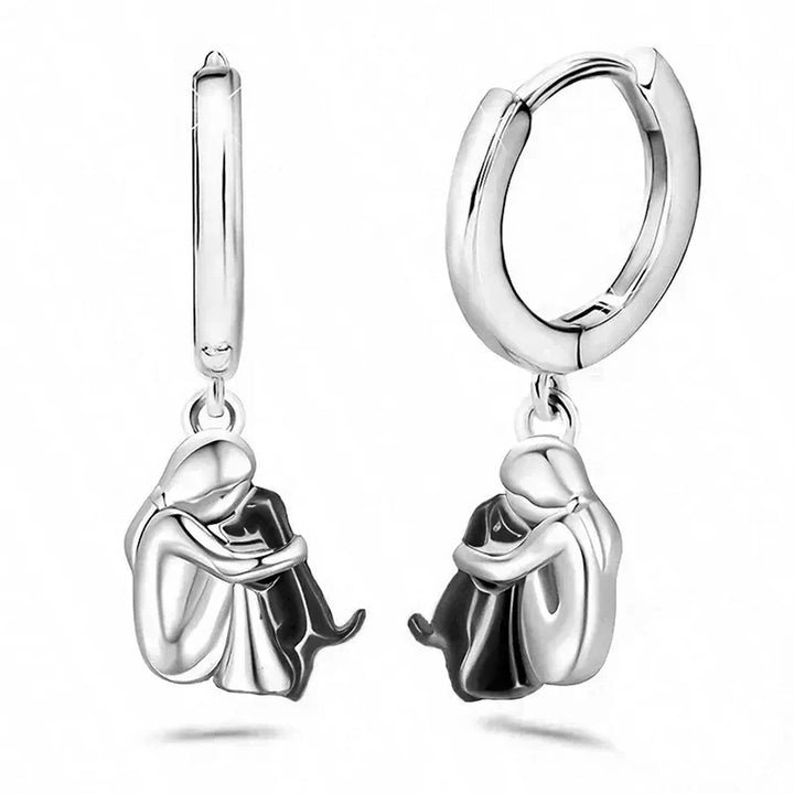 Boucles d'oreilles étreinte de chien