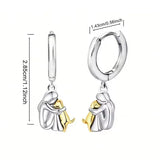 Boucles d'oreilles étreinte de chien