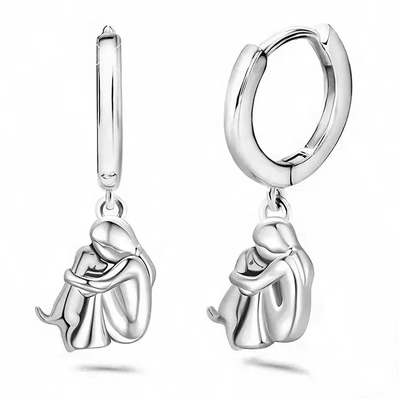 Boucles d'oreilles étreinte de chien