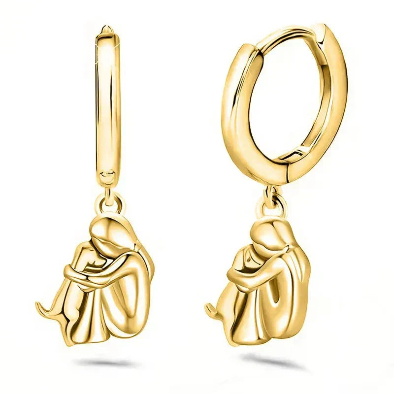 Boucles d'oreilles étreinte de chien