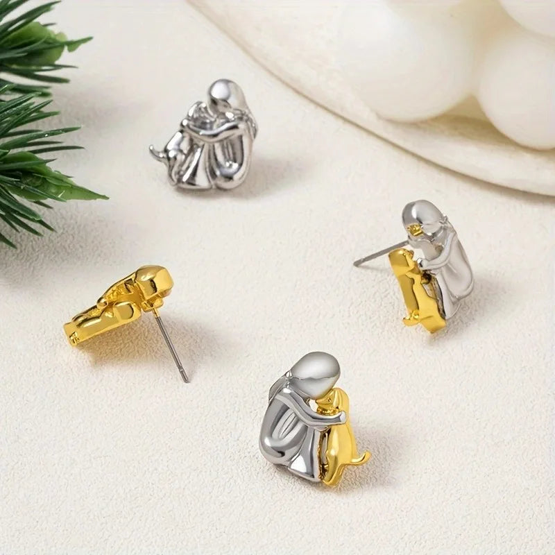 Boucles d'oreilles étreinte de chien