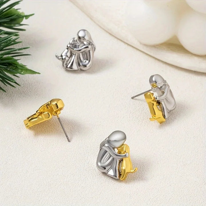 Boucles d'oreilles étreinte de chien