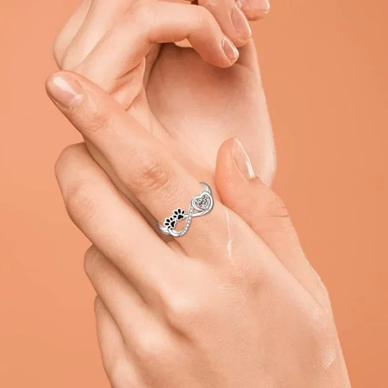 Bague avec empreinte de patte, cœur de zircons et symbole infini