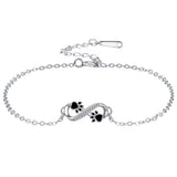 Bracelet avec symbole infini et breloque patte avec zircone