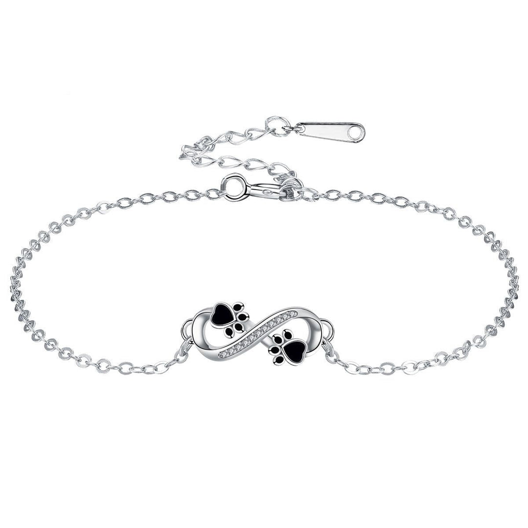 Bracelet avec symbole infini et breloque patte avec zircone