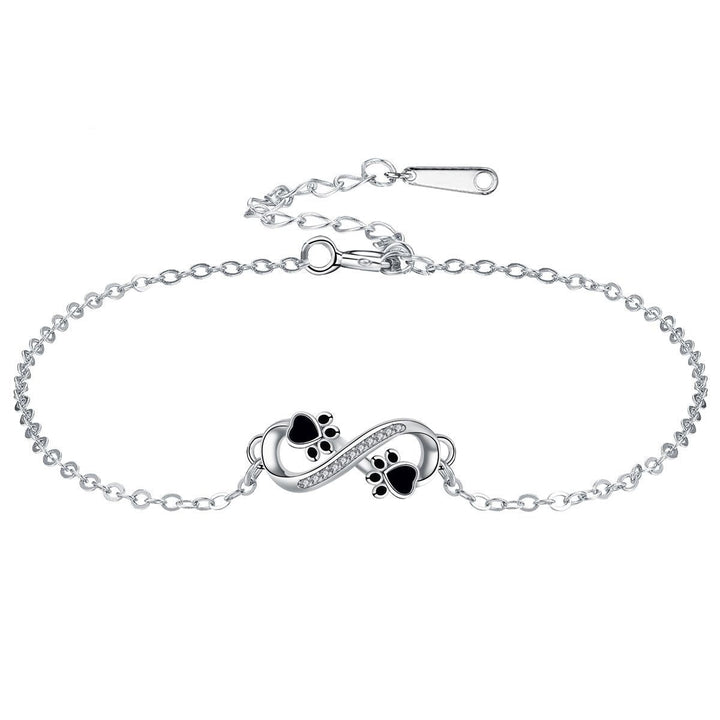 Bracelet avec symbole infini et breloque patte avec zircone