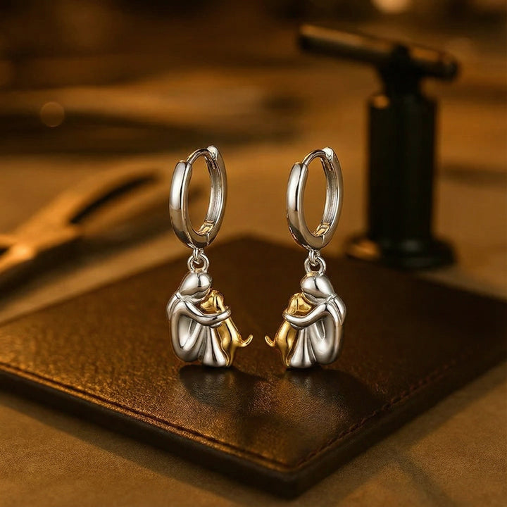 Boucles d'oreilles étreinte de chien