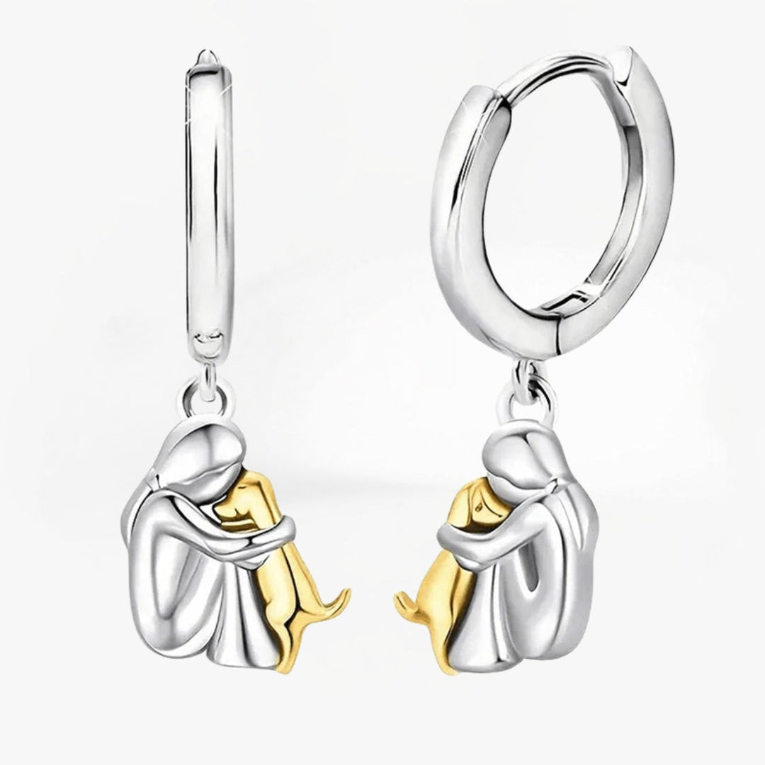 Boucles d'oreilles étreinte de chien